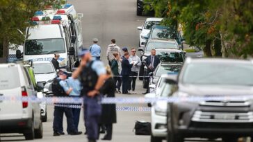 Alexander Street en North Willoughby estaba repleta de policías después de que un agente de policía de NSW matara a tiros a un hombre el jueves por la mañana.