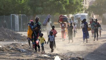 People flee their neighbourhoods amid fighting between the army and paramilitaries in Khartoum following the collapse of a 24-hour truce.