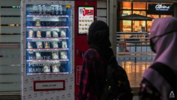 En Malasia, el comercio mediante máquinas expendedoras es una forma de que los grupos de bajos ingresos eviten las dádivas