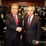 FM Park holds talks with China&apos;s Wang ahead of trilateral talks with Japan