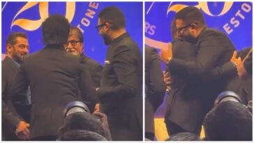 Salman Khan y Abhishek Bachchan se saludan con un abrazo en la fiesta de cumpleaños de Anand Pandit.  Mirar