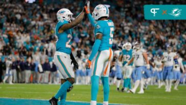 Miami Dolphins cornerback Xavien Howard (25) and cornerback Jalen Ramsey (5) celebrate after a play against the Tennessee Titans during the second quarter at Hard Rock Stadium.