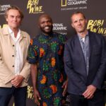 (Left-Right) Christopher Sharp, Moses Bwayo and John Battsek attend the National Geographic Documentary Films “Bobi Wine: The People’s President” premiere.