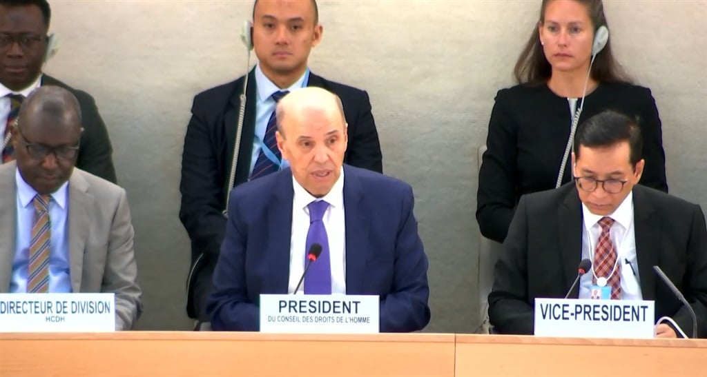 The newly elected president of the UN Human Rights Council, Ambassador Omar Zniber (centre), of Morocco