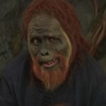 Paul Giamatti looks uncertain while dressed as an ape in Planet of the Apes.