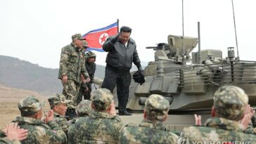 N. Korea unveils new battle tank with leader Kim boasting their striking power