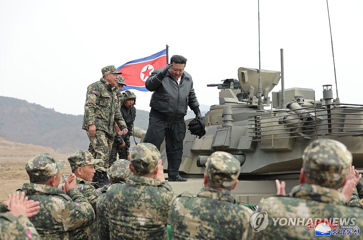 N. Korea unveils new battle tank with leader Kim boasting their striking power