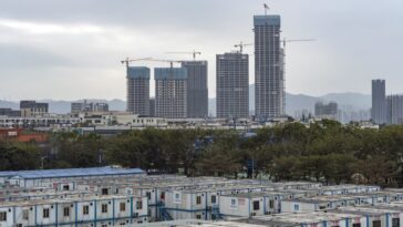 El ministro de Vivienda de China dice que los promotores inmobiliarios deben declararse en quiebra si es necesario