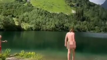 El novio de Alison Hammond, David Putman, de 26 años, ha sido filmado nadando desnudo en un lago ruso.
