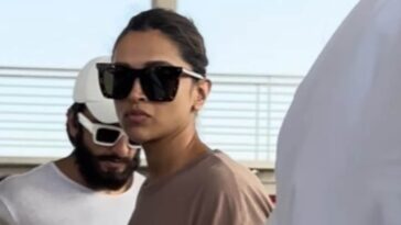 Deepika Padukone aleja la cámara de un fan en el aeropuerto y regresa a Mumbai con Ranveer Singh.  Mirar