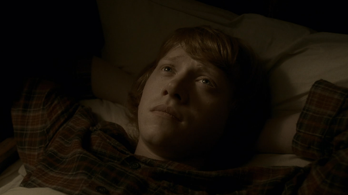 Rupert Grint as Ron in bed during Harry Potter 6