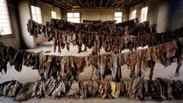Clothes of victims of the Rwandan genocid on display at the Murambi memorial site in February 2003. Some 10 000 people who had sought refuge at the technical school there were slaughtered. (Per-Anders Pettersson/Getty Images)
