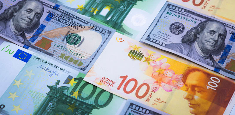 Israeli shekel and US dollar  credit: Shutterstock