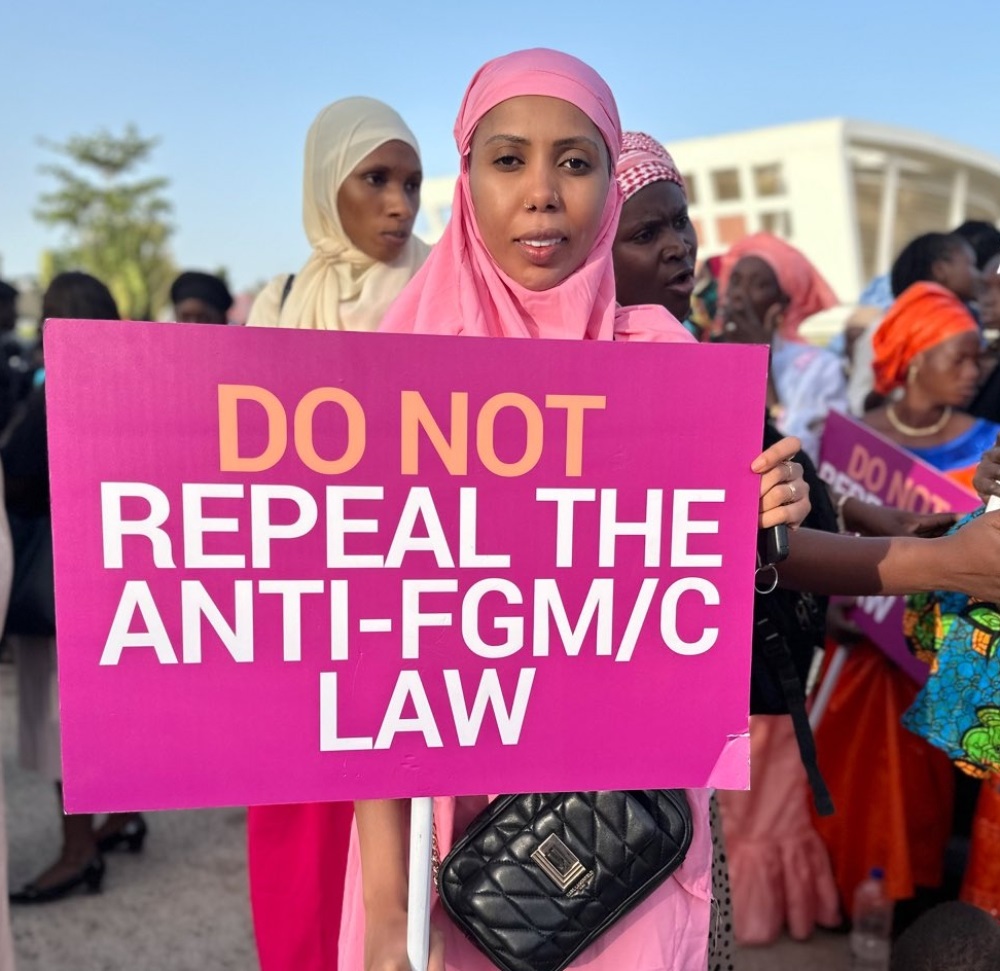 Anti-FGM activist Jaha Marie Dukureh in front of The Gambia National Assembly in March. (@JahaENDFGM/X formerly Twitter)