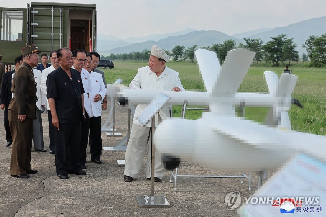 (2nd LD) N. Korean leader calls for developing, producing more suicide drones