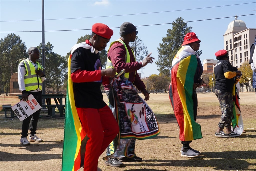 Disgruntled Zimbabwean nationals protested against high passport price increases. (Alfonso Nqunjana/News24)