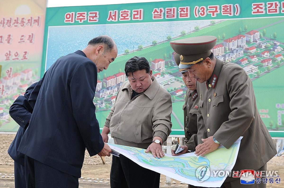 (LEAD) N.K. leader urges swift reconstruction in flood-devastated regions