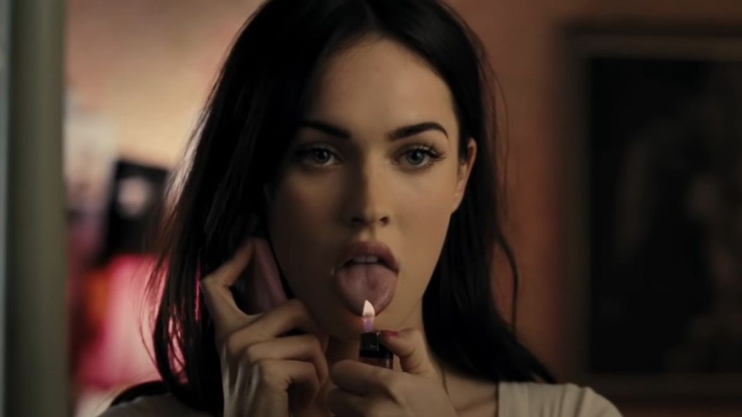 Megan Fox&#039;s Jennifer holding a lighter flame up to her tongue in Jennifer&#039;s Body