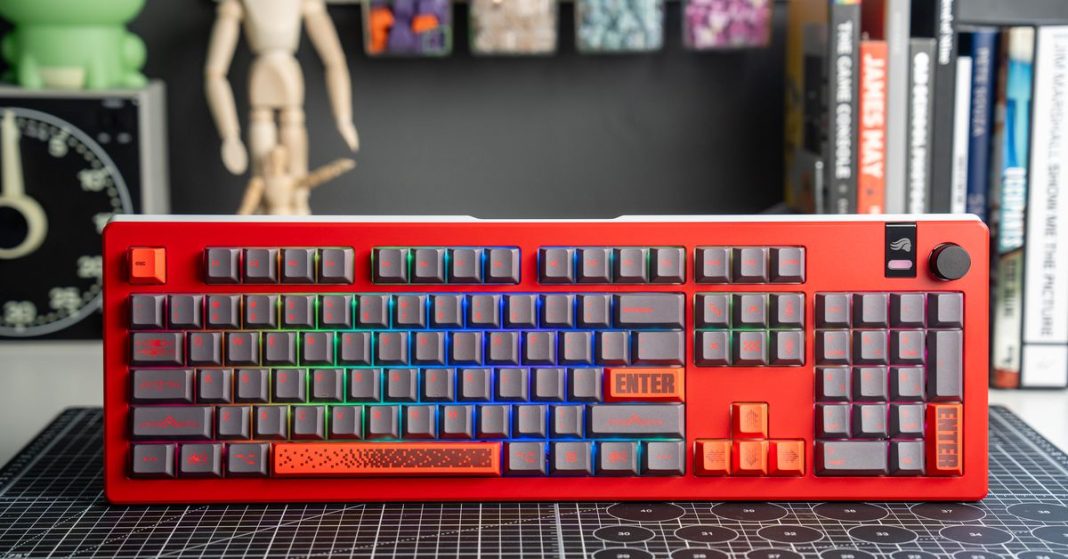 The Glorious GMMK 3 Pro full-size mechanical keyboard propped upright on a desk.