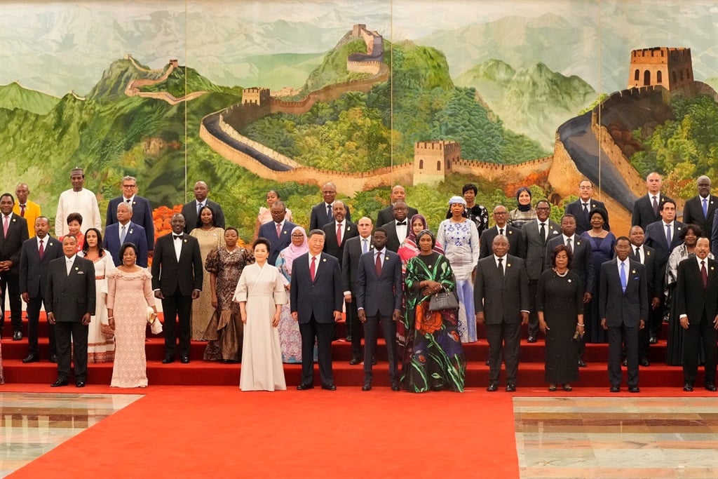 Chinas President Xi Jinping (front 4th L) and his wife Peng Liyuan (front 3rd L) pose for a group photograph with leaders from African nations ahead of a dinner reception during the Forum on China-Africa Cooperation (FOCAC) at the Great Hall of the People in Beijing on 4 September 2024. (Ken Ishii/ AFP)