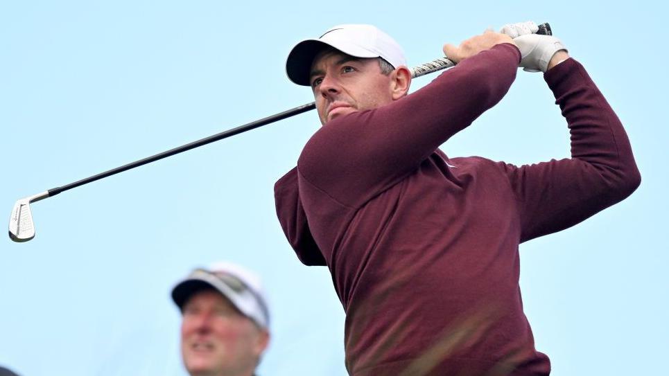 McIlroy hits a shot at the fifth at Royal County Down