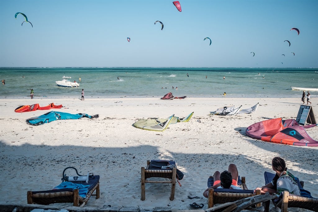 A general view of people kite surfing in Paje, Zanzibar, on 12 January 2022.  (Sumy Sadurni / AFP)