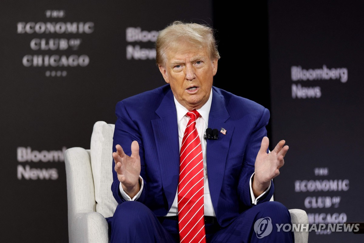 Former U.S. President Donald Trump speaks during an interview with Bloomberg Editor-in-Chief John Micklethwait at the Economic Club of Chicago in Chicago, Illinois, on Oct. 15, 2024 in this photo released by AFP. (Yonhap) 