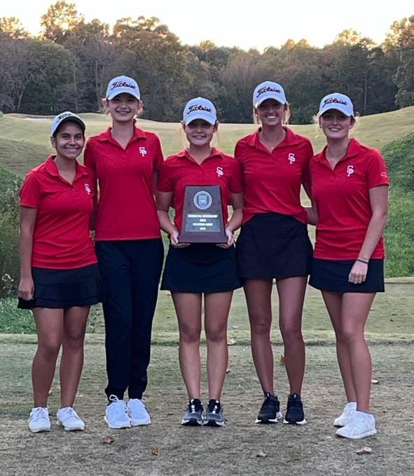 South Point girls golf players show off their 2024 NCHSAA 3A West regional trophy.