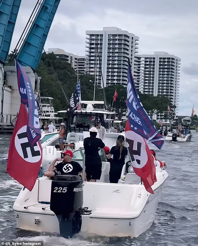 Un grupo de neonazis fueron vistos paseando en el desfile de barcos de Trump durante el fin de semana con banderas y camisetas con la esvástica.