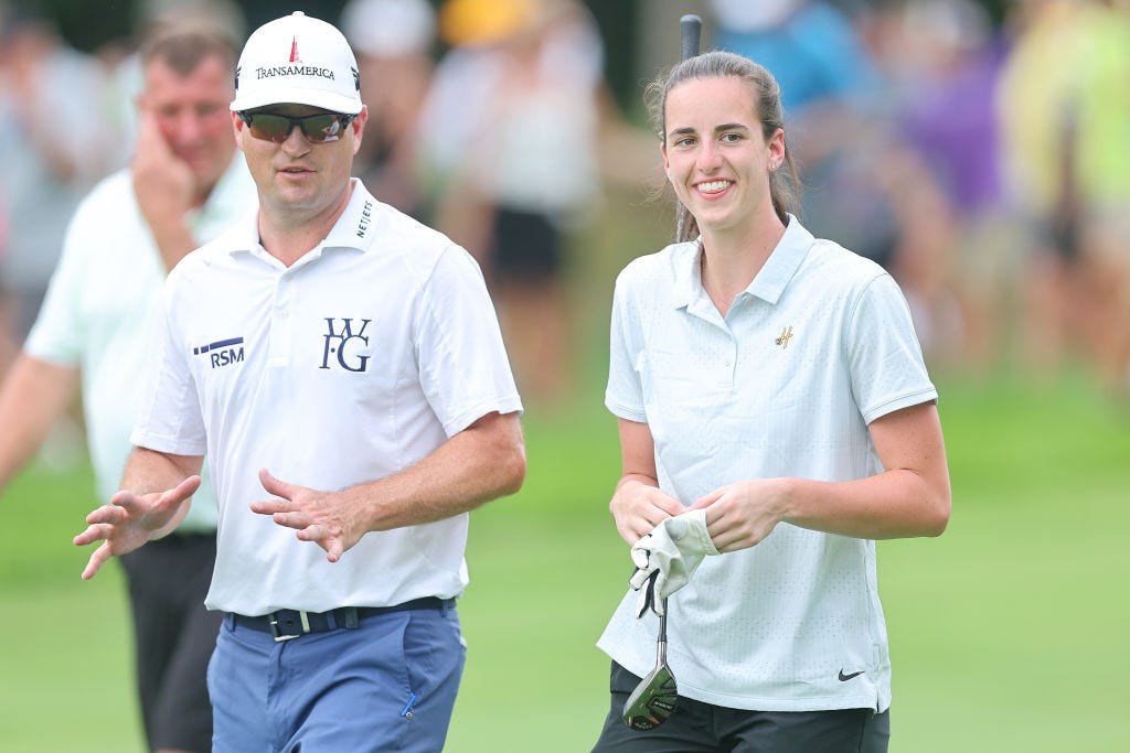 SILVIS, ILLINOIS - JULY 05: Zach Johnson of the United States talks with Caitlin Clark of the Iowa Hawkeyes during the pro-am prior to the John Deere Classic at TPC Deere Run on July 05, 2023 in Silvis, Illinois. (Photo by Michael Reaves/Getty Images)