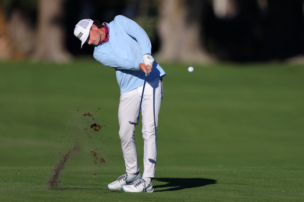 Luke Clanton, a Florida State junior, follows through on a shot to the ninth green of the Sea Island Golf Club Plantation Course during the second round of the RSM Classic on Nov. 22.