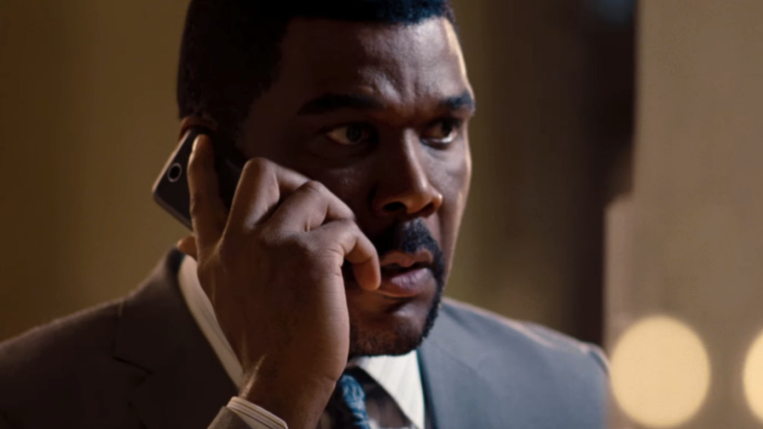 Tyler Perry on the phone in Alex Cross