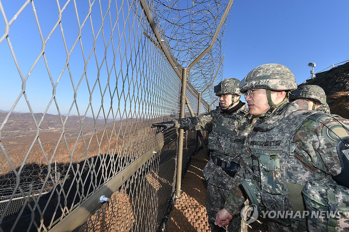 Top military officer inspects partially restored guard post inside DMZ