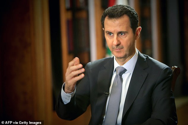 El lucrativo imperio de la 'droga yihadista' de Bashir al-Assad aporta miles de millones de libras al año a las arcas de su régimen sirio (en la foto: al-Assad hablando durante una entrevista con la AFP en el palacio presidencial de Damasco)