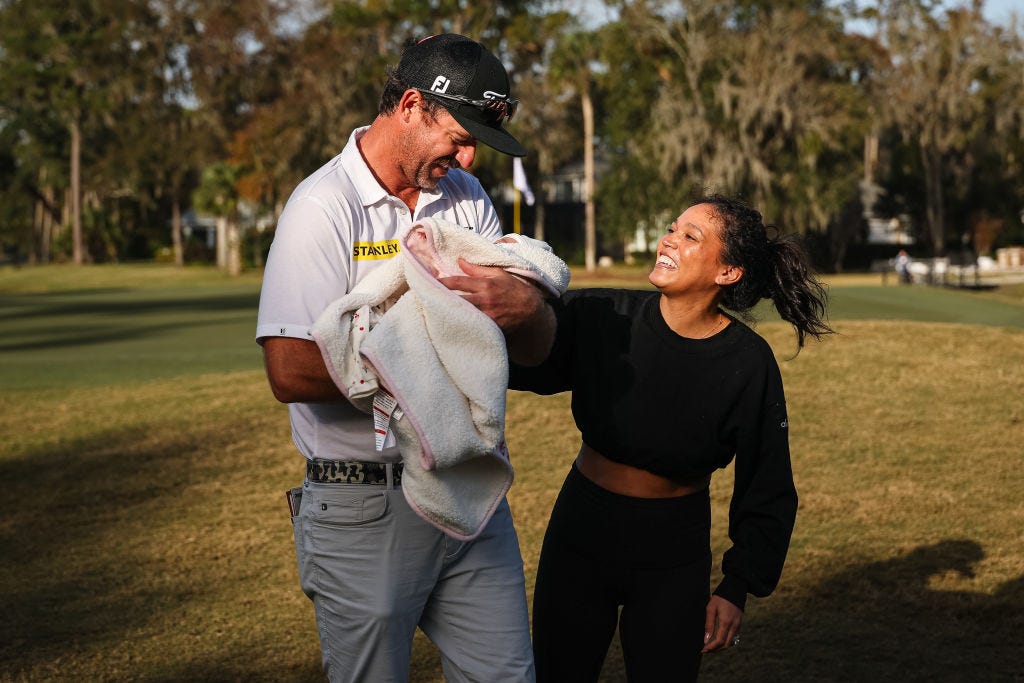 Lanto Griffin of Jacksonville Beach celebrates his victory in the PGA Tour Q-School presented by Korn Ferry on Dec. 15 with his wife Maya and their daughter Navy.