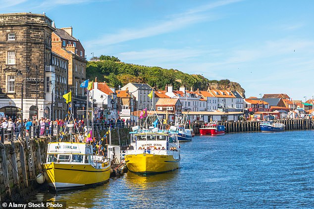 Puerto de Whitby en North Yorkshire. Las personas de mediana edad y mayores que viven cerca del mar tienen menos probabilidades de sufrir deterioro mental relacionado con la edad, según han descubierto los científicos