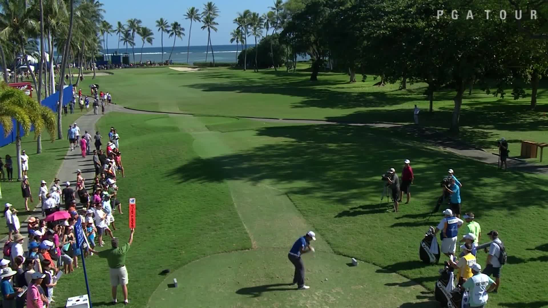 A photo of golfers at Waialae Country Club