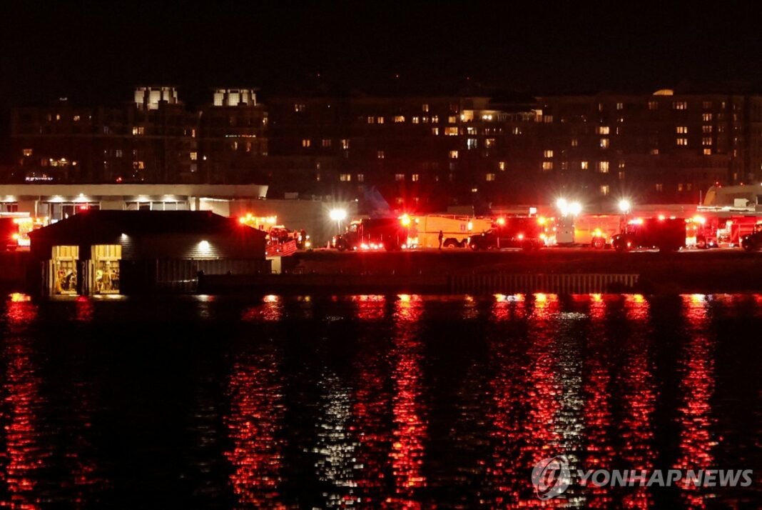 (2nd LD) Passenger plane crashes in Potomac River after collision with Army helicopter