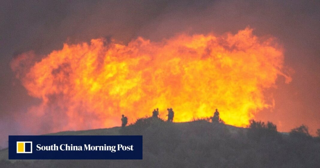 Los bomberos se apresuran para contener los incendios de Los Ángeles antes de que regresen los vientos amenazadores
