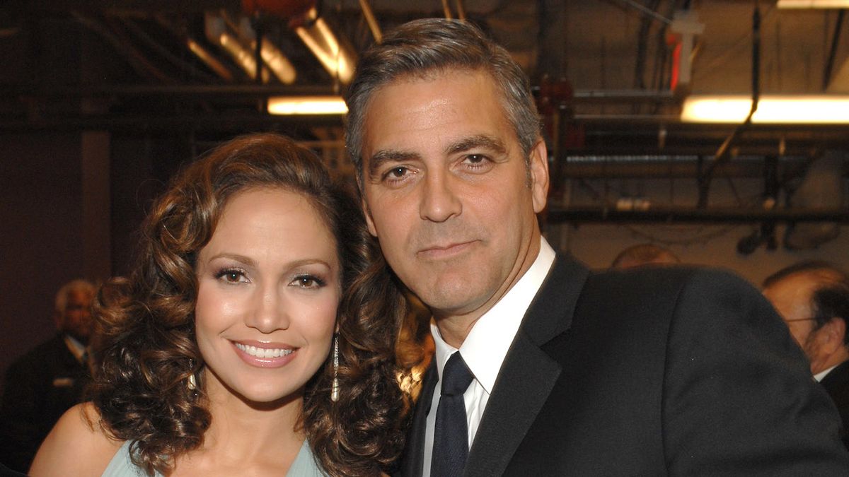 George Clooney and JLo posing at Tony Bennett's 80th to Benefit Paul Newman's Hole in the Wall Camps