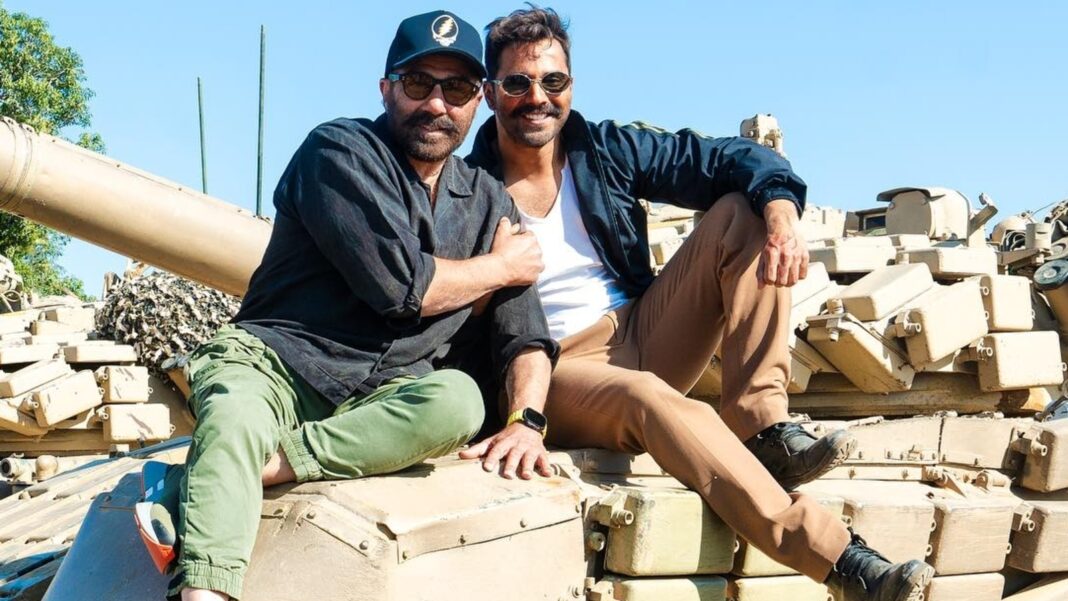 Varun Dhawan posa con Sunny Deol en un petrolero militar, comparte una foto del set de frontera 2. Ver Post
