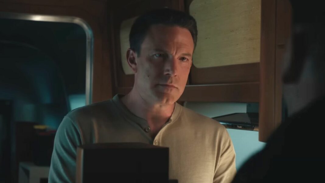 Ben Affleck sitting with an expression of stoic concern in The Accountant 2.