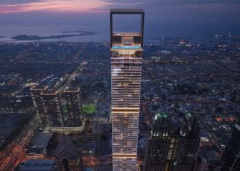 Vista aérea de Trump International Hotel and Tower Dubai por la noche.
