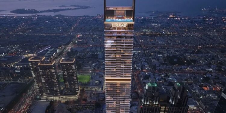 Vista aérea de Trump International Hotel and Tower Dubai por la noche.