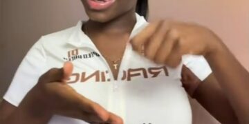 Captura de pantalla del video de Tiktok de una mujer joven anunciando su próxima graduación de la escuela de enfermería.