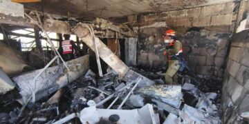 Daño de topografía de personal de IDF en un sitio de ataque de misiles.