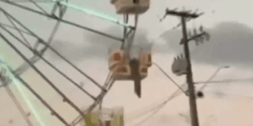 Rueda de la fortuna en una tormenta de arena.