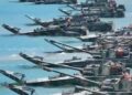 Vehículos anfibios militares en el agua.