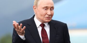 Vladimir Putin reaccionando.