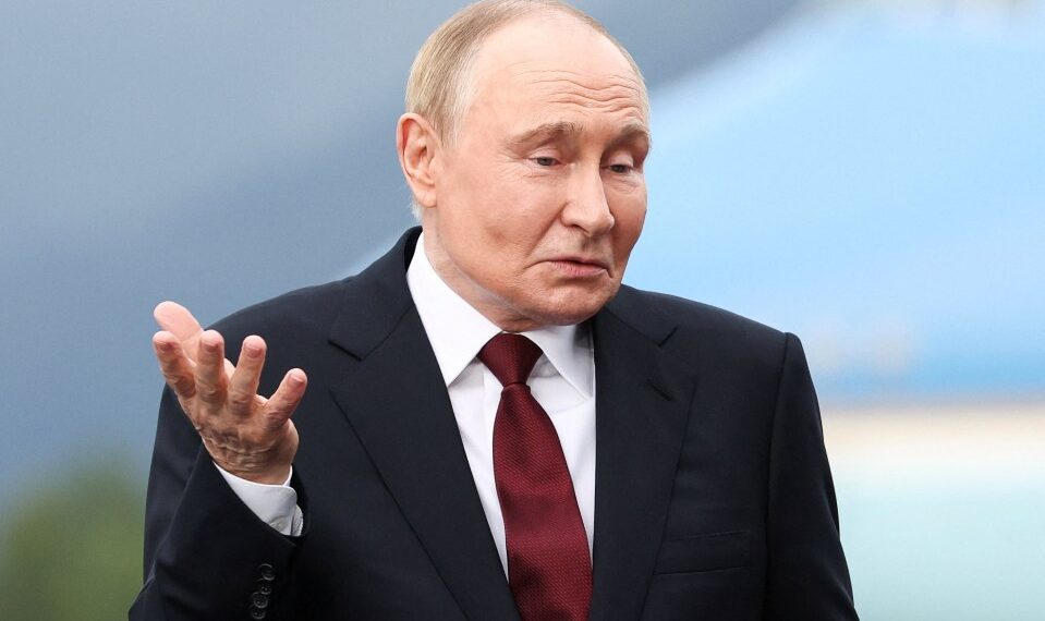 Vladimir Putin reaccionando.